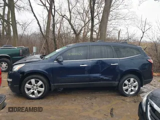 2016 Chevrolet Traverse LT z VIN 1GNKRGKD5GJ166369, wystawiony jako IAAI lot #41468465 z przebiegiem 113 058 mil mil oraz . Historia ofert i sprzedaży dostępna na DreamBid. Obrazek 15.