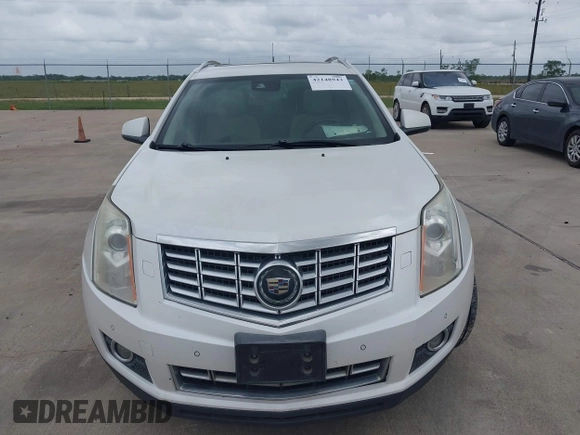 2014 Cadillac SRX Premium Collection with VIN 3GYFNDE31ES615995, listed as a IAAI auction lot 42148943 with 232,752 mi miles and . Bid and sale history available at DreamBid. Image 6.