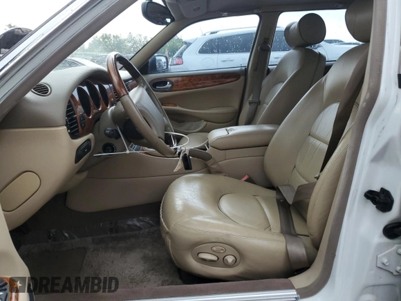 1999 Jaguar XJ with VIN SAJKD6041XC876928, listed as a Copart auction lot 60038405 with 63,917 mi miles and Clean title. Bid and sale history available at DreamBid. Image 7.