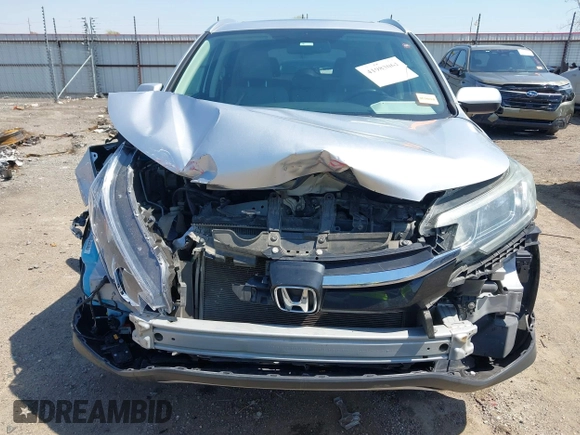 2015 Honda CR-V EX-L with VIN 2HKRM3H70FH552818, listed as a IAAI auction lot 41983061 with 202,898 mi miles and . Bid and sale history available at carsss.com. Image 6.