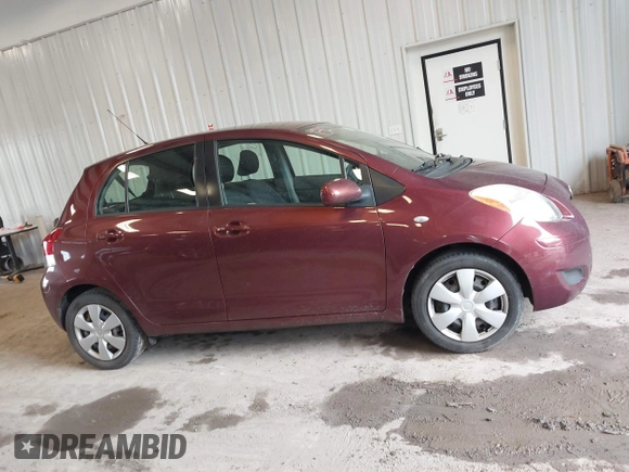 2010 Toyota Yaris z VIN JTDKT4K37A5289171, wystawiony jako IAAI lot #42436707 z przebiegiem 118 810 mil mil oraz . Historia ofert i sprzedaży dostępna na DreamBid. Obrazek 13.