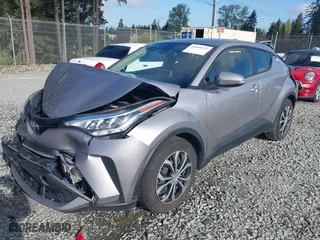 2020 Toyota C-HR LE with VIN JTNKHMBXXL1077939, listed as a IAAI auction lot 42044122 with 47,140 mi miles. Bid and sale history available at carsss.com. Image 2.