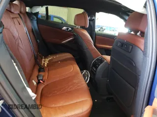 2023 BMW X6 M50i with VIN 5UXCY8C03P9N56839, listed as a Copart auction lot 63609632 with 0 mi miles. Bid and sale history available at carsss.com. Image 6.
