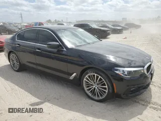 2018 BMW 5 Series 530i with VIN WBAJA5C54JG899845, listed as a Copart auction lot 48994145 with 57,379 mi miles and Salvage Title. Bid and sale history available at DreamBid. Image 4.