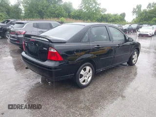 2005 Ford Focus S with VIN 1FAHP34N55W199644, listed as a IAAI auction lot 42351890 with 179,365 mi miles and . Bid and sale history available at DreamBid. Image 4.