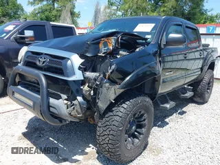 2015 Toyota Tacoma with VIN 5TFLU4EN9FX143428, listed as a IAAI auction lot 42173370 with 200,447 mi miles and . Bid and sale history available at DreamBid. Image 6.