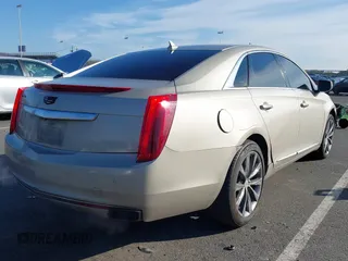 2013 Cadillac XTS Luxury z VIN 2G61R5S31D9185009, wystawiony jako IAAI lot #41243001 z przebiegiem 161 219 mil mil oraz . Historia ofert i sprzedaży dostępna na DreamBid. Obrazek 4.