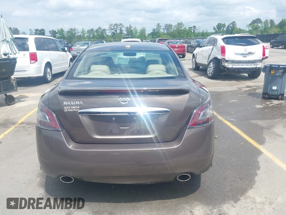 2014 Nissan Maxima S with VIN 1N4AA5AP9EC430843, listed as a IAAI auction lot 42104446 with 159,256 mi miles and . Bid and sale history available at DreamBid. Image 16.