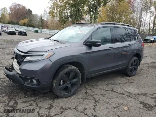 2021 Honda Passport Elite with VIN 5FNYF8H09MB009212, listed as a Copart auction lot 81856694 with 96717 miles and Salvage Title. Bid and sale history available at carsss.com. Image 1.