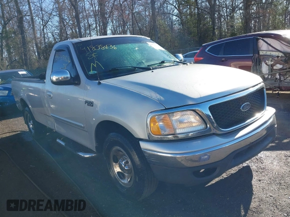 2002 Ford F-150 XL with VIN 1FTRF17242NA48027, listed as a IAAI auction lot 41838636 with 69,821 mi miles. Bid and sale history available at carsss.com. Image 1.