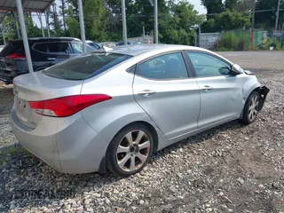 2013 Hyundai Elantra Limited with VIN 5NPDH4AE9DH152427, listed as a IAAI auction lot 40043156 with 130,024 mi miles and . Bid and sale history available at DreamBid. Image 4.