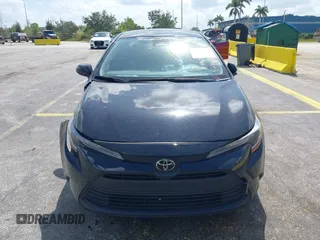2023 Toyota Corolla LE with VIN JTDB4MEE2PJ004869, listed as a IAAI auction lot 42139964 with 41,119 mi miles. Bid and sale history available at carsss.com. Image 12.