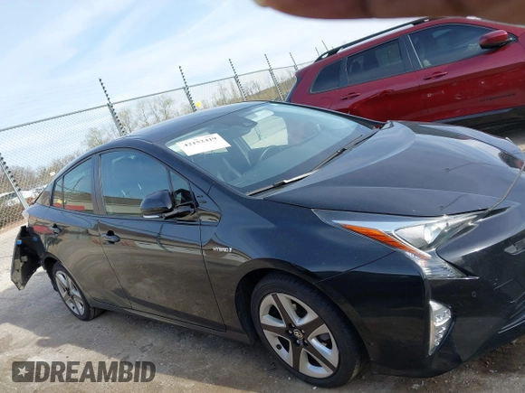 2017 Toyota Prius Two with VIN JTDKARFU5H3045014, listed as a IAAI auction lot 42152419 with 69,760 mi miles and . Bid and sale history available at DreamBid. Image 13.