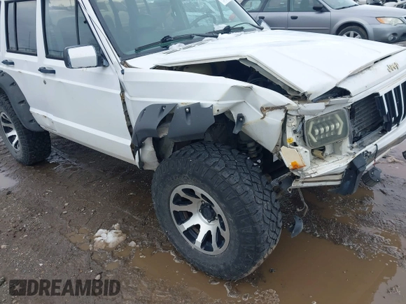 1990 Jeep Cherokee with VIN 1J4FJ78L0LL217723, listed as a IAAI auction lot 41788403 with 147,557 mi miles and . Bid and sale history available at DreamBid. Image 12.