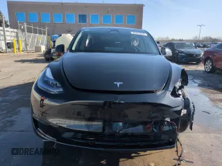2023 Tesla Model Y Long Range with VIN 7SAYGDEE5PF850358, listed as a Copart auction lot 52581615 with 19,376 mi miles and Salvage Title. Bid and sale history available at DreamBid. Image 5.