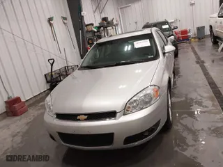 2013 Chevrolet Impala LTZ with VIN 2G1WC5E37D1241848, listed as a IAAI auction lot 41863719 with 167,482 mi miles. Bid and sale history available at carsss.com. Image 12.