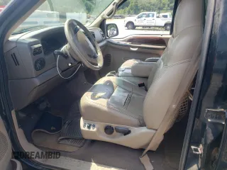 2000 Ford Excursion Limited with VIN 1FMNU42L1YEC61687, listed as a Copart auction lot 67590714 with 219,386 mi miles and Salvage title. Bid and sale history available at DreamBid. Image 7.
