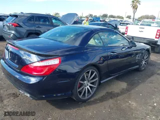 2013 Mercedes-Benz SL-Class SL 63 AMG with VIN WDDJK7EA9DF021219, listed as a IAAI auction lot 41430597 with 98,817 mi miles. Bid and sale history available at carsss.com. Image 4.
