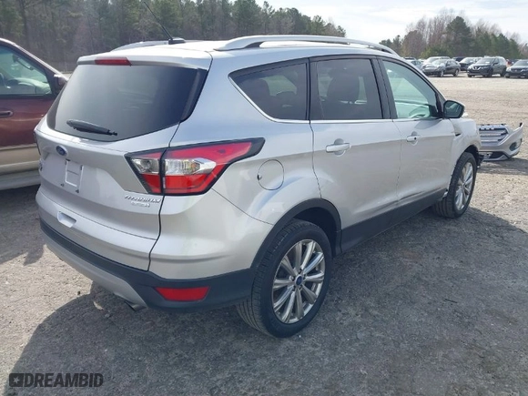 2017 Ford Escape Titanium with VIN 1FMCU0J98HUA45380, listed as a IAAI auction lot 41726720 with 57,400 mi miles. Bid and sale history available at carsss.com. Image 4.