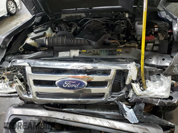 2010 Ford Ranger XLT with VIN 1FTKR4EE4APA29763, listed as a Copart auction lot 57779915 with 158,941 mi miles and Salvage title. Bid and sale history available at DreamBid. Image 11.