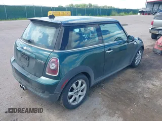 2009 MINI Hardtop S with VIN WMWMF73599TW83678, listed as a IAAI auction lot 42750705 with 95,278 mi miles and . Bid and sale history available at DreamBid. Image 4.