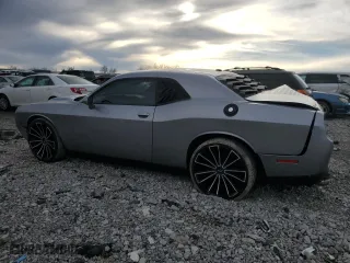 2017 Dodge Challenger SXT with VIN 2C3CDZAG9HH640351, listed as a Copart auction lot 46118655 with 128,213 mi miles and Salvage Title. Bid and sale history available at carsss.com. Image 2.