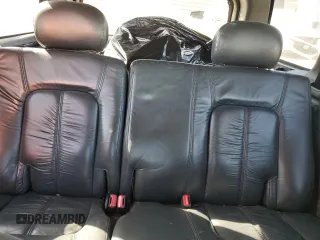 2000 Oldsmobile Bravada z VIN 1GHDT13W8Y2333619, wystawiony jako Copart lot #49631575 z przebiegiem 256 252 mil mil oraz Szkoda całkowita • Salvage title. Historia ofert i sprzedaży dostępna na DreamBid. Obrazek 10.