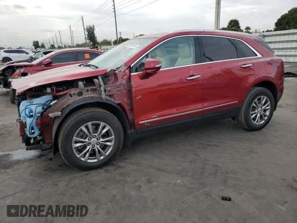 2021 Cadillac XT5 FWD Premium Luxury with VIN 1GYKNCRS7MZ149310, listed as a Copart auction lot 87937445 with 13,829 mi miles and Salvage Title. Bid and sale history available at DreamBid. Image 1.