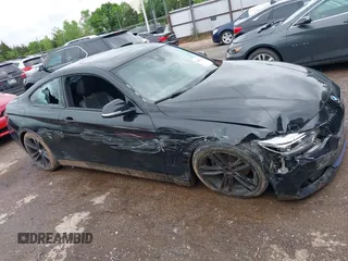 2015 BMW 4 Series 428i xDrive with VIN WBA3N5C56FK198340, listed as a IAAI auction lot 42153190 with 96,054 mi miles and . Bid and sale history available at DreamBid. Image 13.
