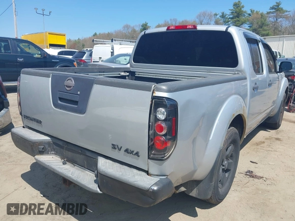 2011 Nissan Frontier Pro-4X with VIN 1N6AD0EVXBC407089, listed as a IAAI auction lot 42113537 with 124,853 mi miles and . Bid and sale history available at DreamBid. Image 4.