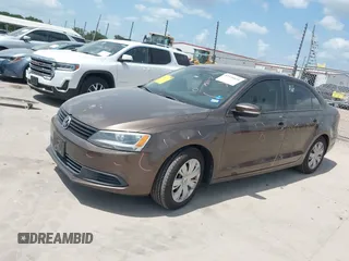 2012 Volkswagen Jetta SE with VIN 3VWDX7AJ3CM121987, listed as a IAAI auction lot 42520818 with 149,997 mi miles and . Bid and sale history available at DreamBid. Image 2.