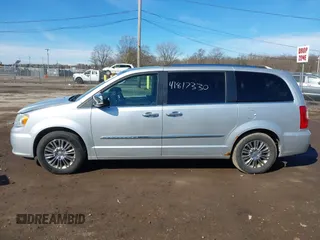 2011 Chrysler Town & Country Limited z VIN 2A4RR6DG1BR609818, wystawiony jako IAAI lot #41817330 z przebiegiem 160 482 mil mil oraz . Historia ofert i sprzedaży dostępna na DreamBid. Obrazek 15.