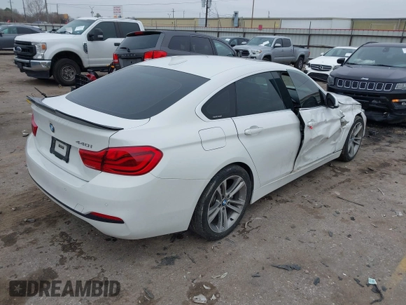 2018 BMW 4 Series 440i with VIN WBA4J5C56JBF07087, listed as a IAAI auction lot 41421921 with 61,601 mi miles and . Bid and sale history available at DreamBid. Image 4.