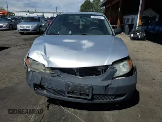 2003 Mazda Protege DX with VIN JM1BJ225730217866, listed as a Copart auction lot 53854075 with 105,782 mi miles and Salvage Title. Bid and sale history available at DreamBid. Image 5.