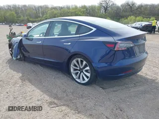 2018 Tesla Model 3 Long Range Battery z VIN 5YJ3E1EB7JF088224, wystawiony jako IAAI lot #42097665 z przebiegiem Nie podano mil oraz . Historia ofert i sprzedaży dostępna na DreamBid. Obrazek 3.