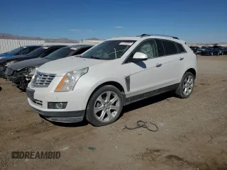 2014 Cadillac SRX Premium Collection z VIN 3GYFNGE33ES582385, wystawiony jako Copart lot #41339855 z przebiegiem Nie podano mil oraz Szkody całkowita. Historia ofert i sprzedaży dostępna na DreamBid. Obrazek 1.