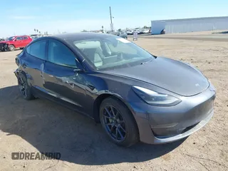 2021 Tesla Model 3 Standard Range Plus z VIN 5YJ3E1EAXMF048666, wystawiony jako IAAI lot #42155267 z przebiegiem Nie podano mil oraz . Historia ofert i sprzedaży dostępna na DreamBid. Obrazek 1.