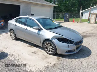 2015 Dodge Dart SXT z VIN 1C3CDFBB5FD213311, wystawiony jako IAAI lot #42401420 z przebiegiem 209 771 mil mil oraz . Historia ofert i sprzedaży dostępna na DreamBid. Obrazek 1.