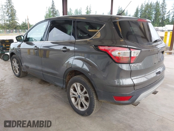 2017 Ford Escape SE z VIN 1FMCU9G93HUC97081, wystawiony jako IAAI lot #42327866 z przebiegiem 97 580 mil mil oraz . Historia ofert i sprzedaży dostępna na DreamBid. Obrazek 3.