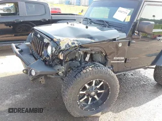 2017 Jeep Wrangler Sport with VIN 1C4AJWAG6HL654592, listed as a IAAI auction lot 42447379 with 61,585 mi miles and . Bid and sale history available at DreamBid. Image 6.