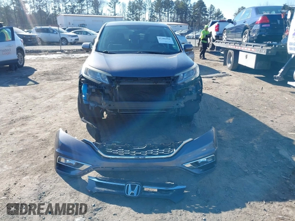 2016 Honda CR-V EX with VIN 5J6RM4H58GL095297, listed as a IAAI auction lot 41386994 with 154,595 mi miles and . Bid and sale history available at DreamBid. Image 12.