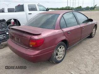 2002 Saturn SL z VIN 1G8ZF52802Z248375, wystawiony jako IAAI lot #42180352 z przebiegiem Nie podano mil oraz . Historia ofert i sprzedaży dostępna na DreamBid. Obrazek 4.