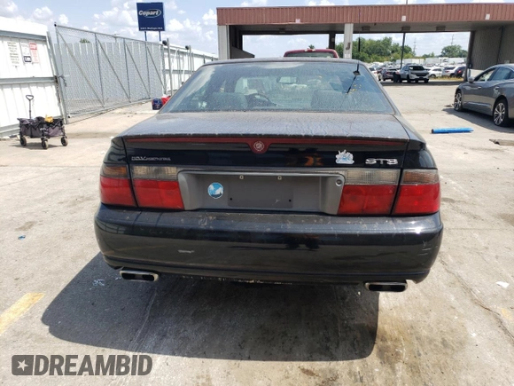 2001 Cadillac Seville Touring STS z VIN 1G6KY54961U257426, wystawiony jako Copart lot #45269275 z przebiegiem 177 990 mil mil oraz Nie do naprawy • Non repairable. Historia ofert i sprzedaży dostępna na DreamBid. Obrazek 6.