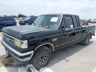 1990 Ford F-150 with VIN 1FTEX15N0LKA06904, listed as a IAAI auction lot 42603529 with 473,180 mi miles and . Bid and sale history available at DreamBid. Image 2.