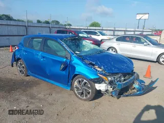 2018 Toyota Corolla iM with VIN JTNKARJE9JJ562572, listed as a IAAI auction lot 39943009 with 126,604 mi miles. Bid and sale history available at carsss.com. Image 1.