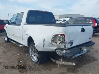 2001 Ford F-150 XLT with VIN 1FTRW07L81KE91672, listed as a IAAI auction lot 42021661 with 200,000 mi miles and . Bid and sale history available at DreamBid. Image 6.