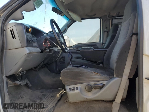 2002 Ford F-250 XL with VIN 1FTNW20F12EA44390, listed as a Copart auction lot 83888084 with 285,250 mi miles and Salvage Title. Bid and sale history available at DreamBid. Image 7.