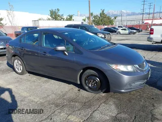 2015 Honda Civic Sedan LX with VIN 19XFB2E51FE061538, listed as a IAAI auction lot 41761473 with 113,404 mi miles. Bid and sale history available at carsss.com. Image 1.