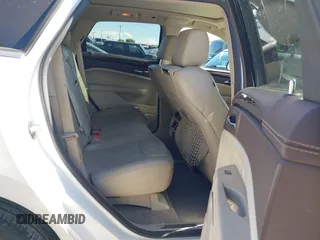 2011 Cadillac SRX Turbo Premium Collection with VIN 3GYFNKE68BS532056, listed as a IAAI auction lot 42447059 with 104,969 mi miles and . Bid and sale history available at DreamBid. Image 8.