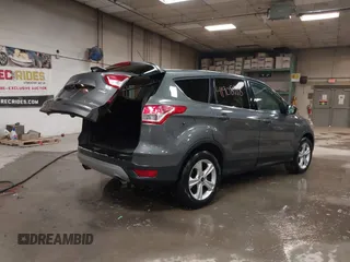 2014 Ford Escape SE with VIN 1FMCU9G9XEUD69423, listed as a IAAI auction lot 41908718 with 65,149 mi miles. Bid and sale history available at carsss.com. Image 4.
